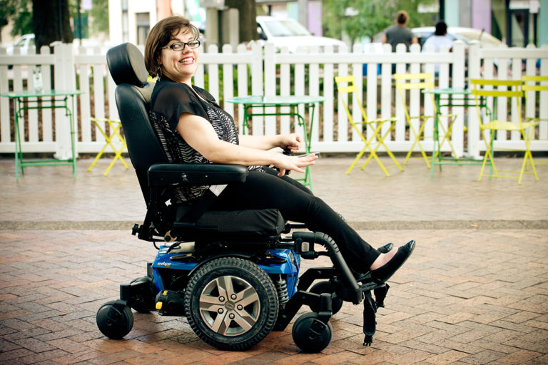 Woman in wheelchair smiling