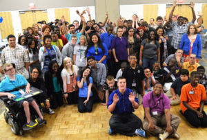 A large group of students pose for a picture.