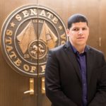 Jose Morales in front of the Florida Senate chamber