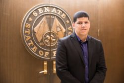 Jose Morales in front of the Florida Senate chamber