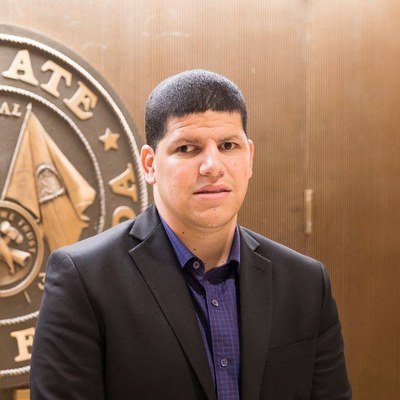 Jose Morales in front of the Florida Senate chamber