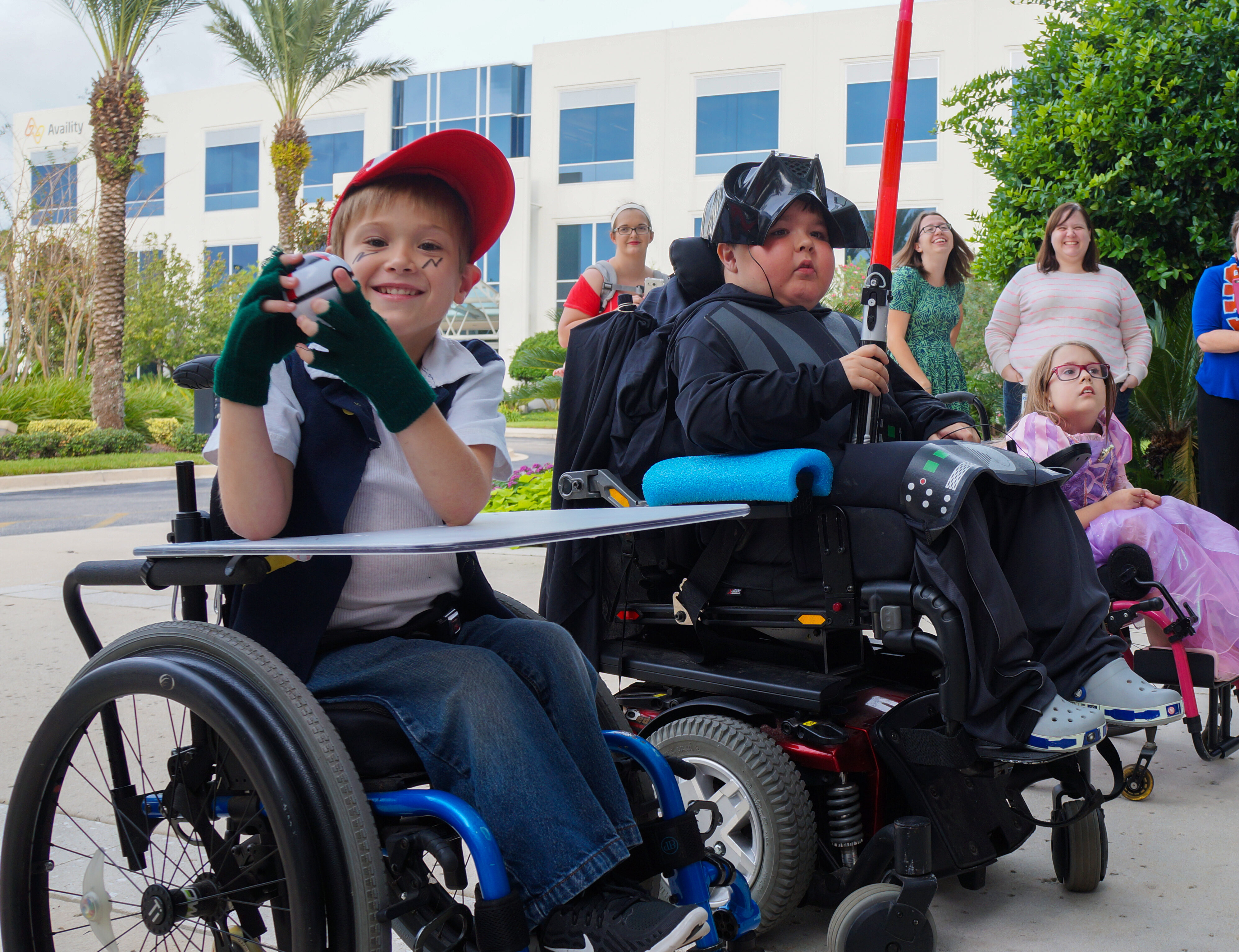 Youth using wheelchairs Kids in wheelchairs show off their Halloween costumes