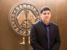 Jose Morales in front of the Florida Senate chamber