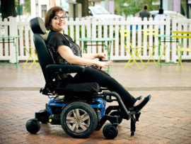 Woman in wheelchair smiling